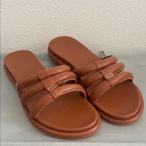 New OluKai Women’s Taire Slide 
Brown Leather Sandals